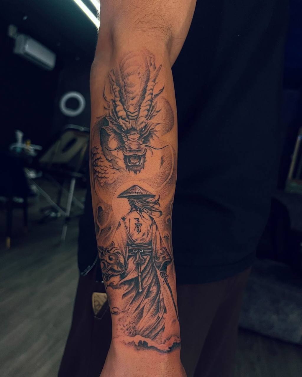Japanese dragon and samurai forearm tattoo